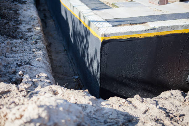 Professional Emergency Waterproofing technician working in Athens, AL